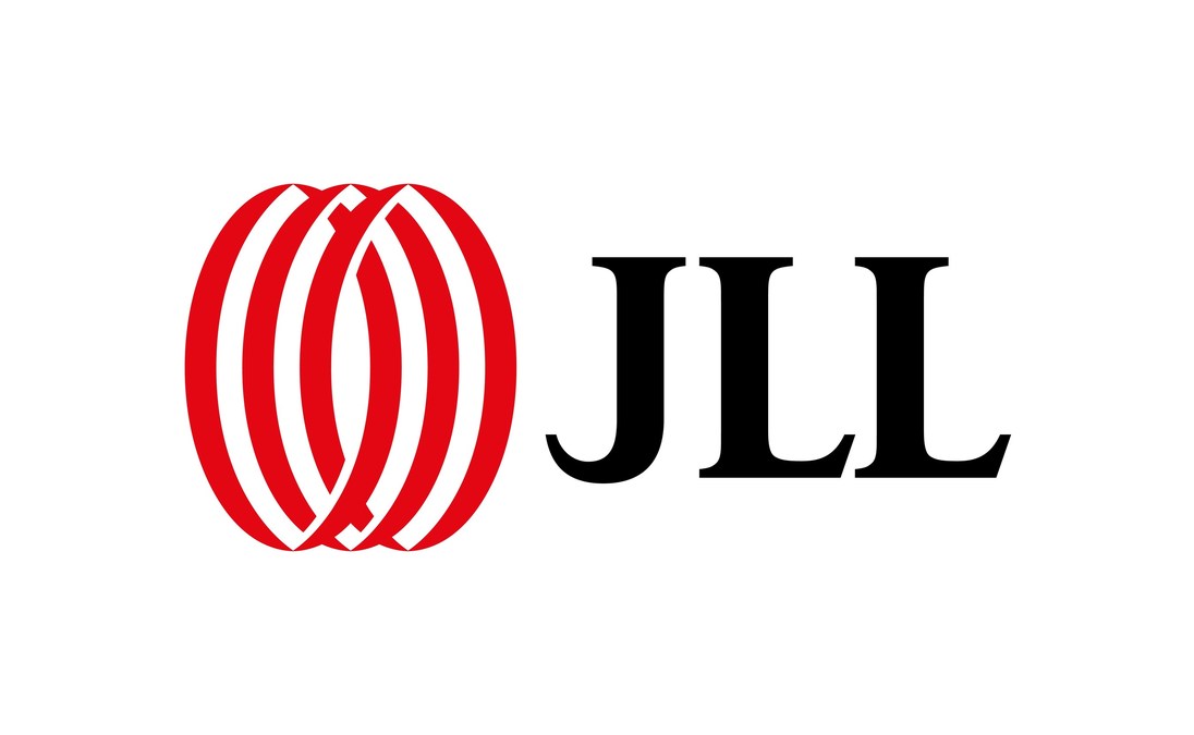 JLL professionals using leasing technology at a commercial office building in Chicago.