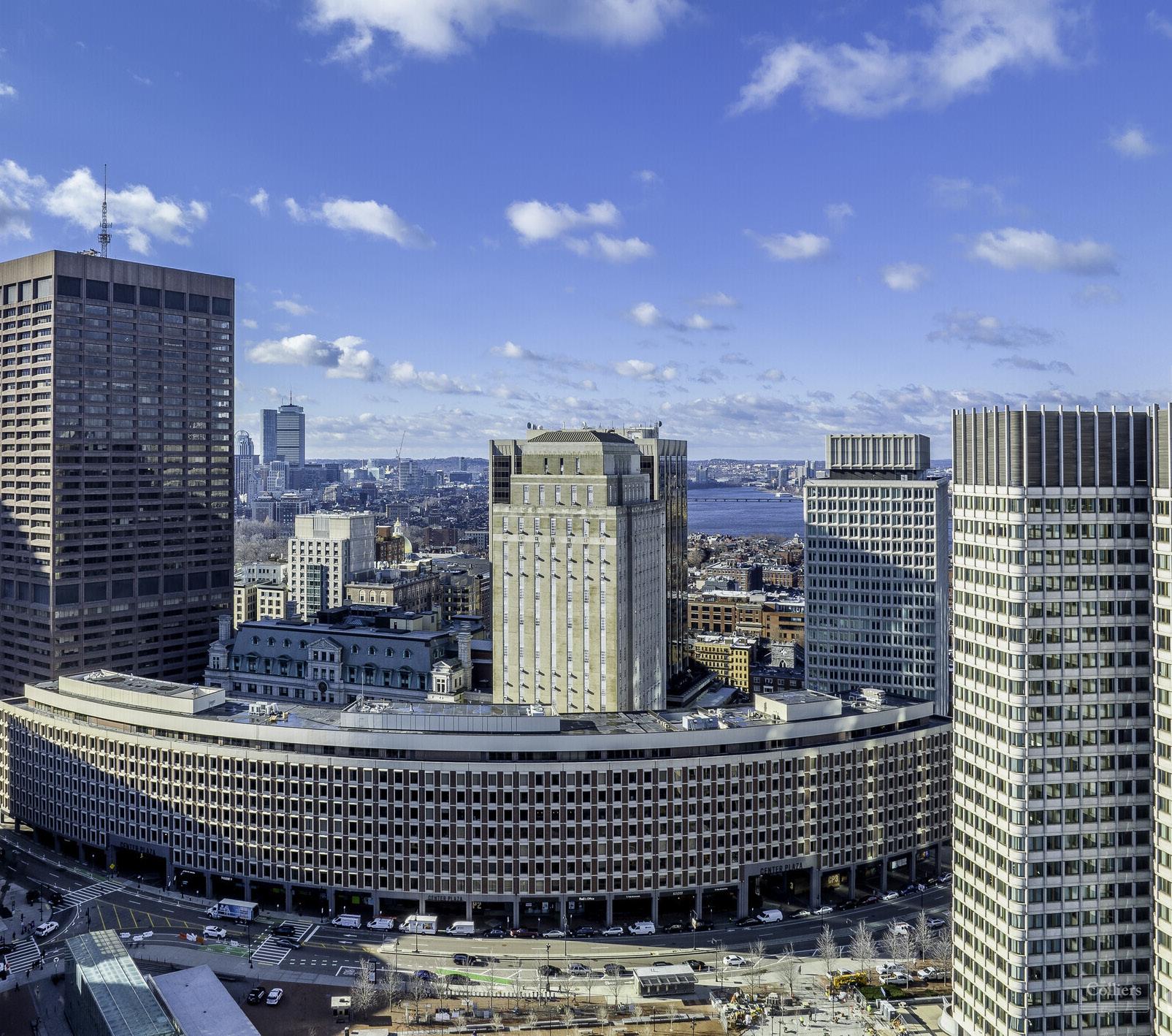 Boston office market scene with stable buildings amidst leasing activity.