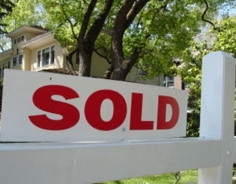 Real estate agents in downtown area facilitate steady property transactions.