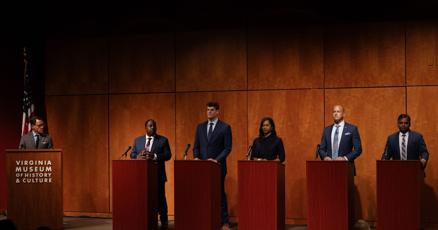 Richmond mayoral candidates discuss property tax policies at public debate forum.