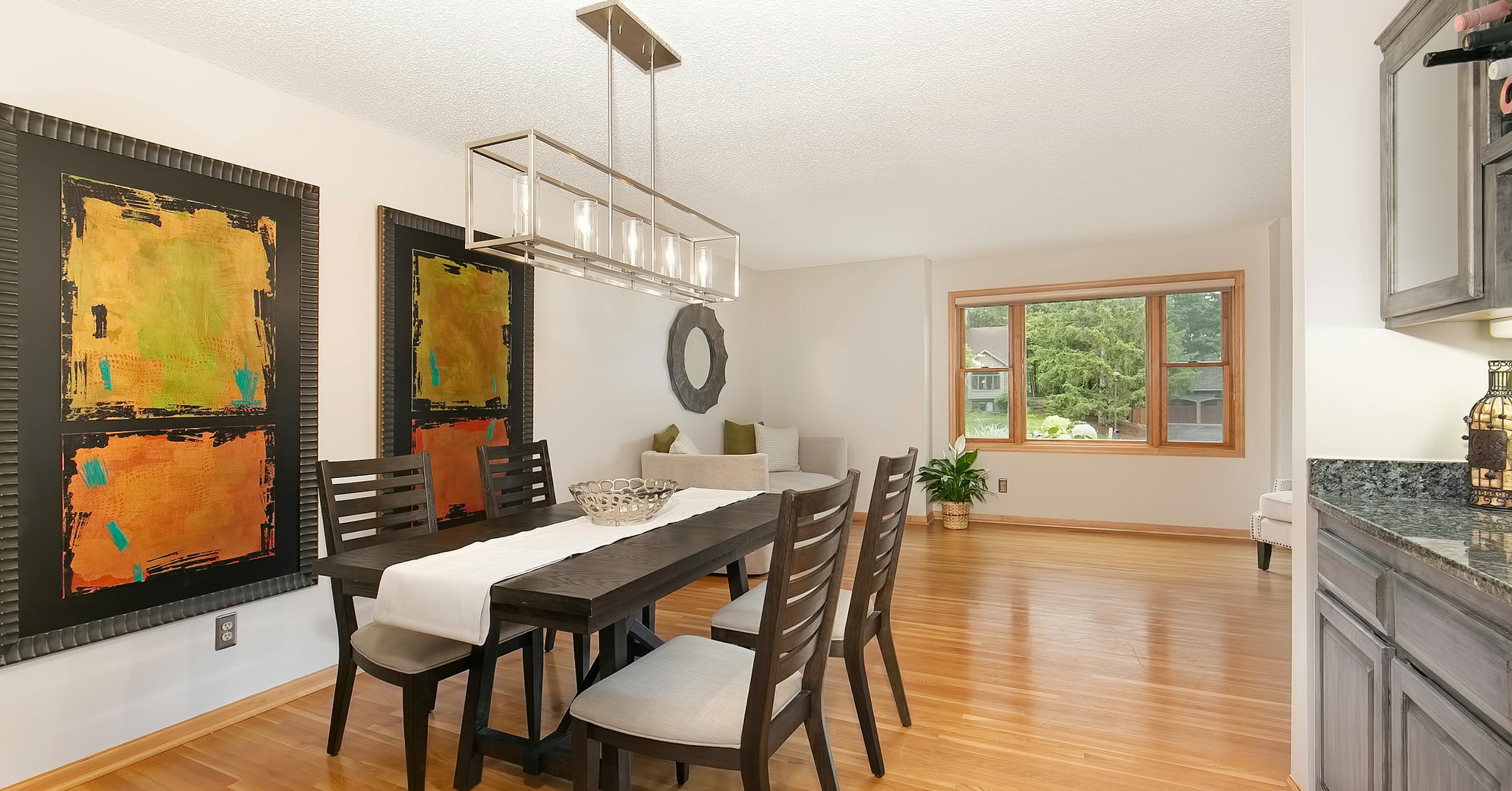 Modern Eden Prairie home for sale on wooded lot in Minnesota suburb.