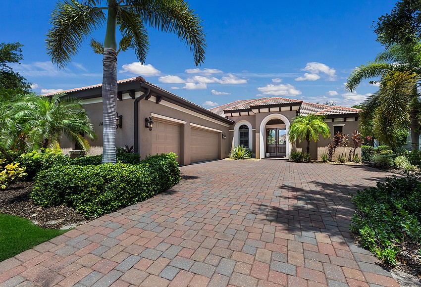 Lakewood Ranch residential sales leaders pose together in a Florida community setting.