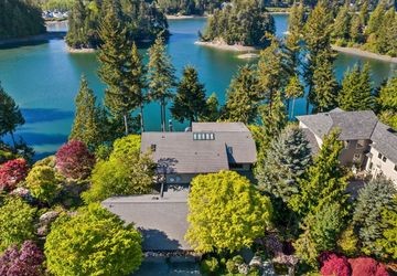 Port Ludlow waterfront mansion with indoor atrium, priced at $4.3 million.