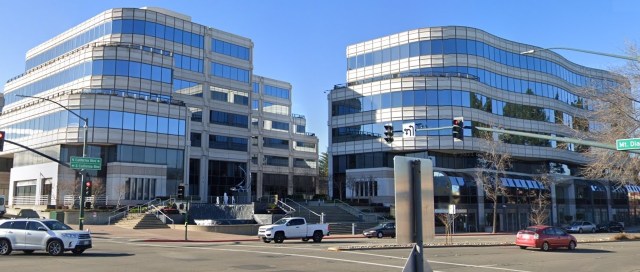 East Bay luxury office complex sold at record price amidst market uncertainty.