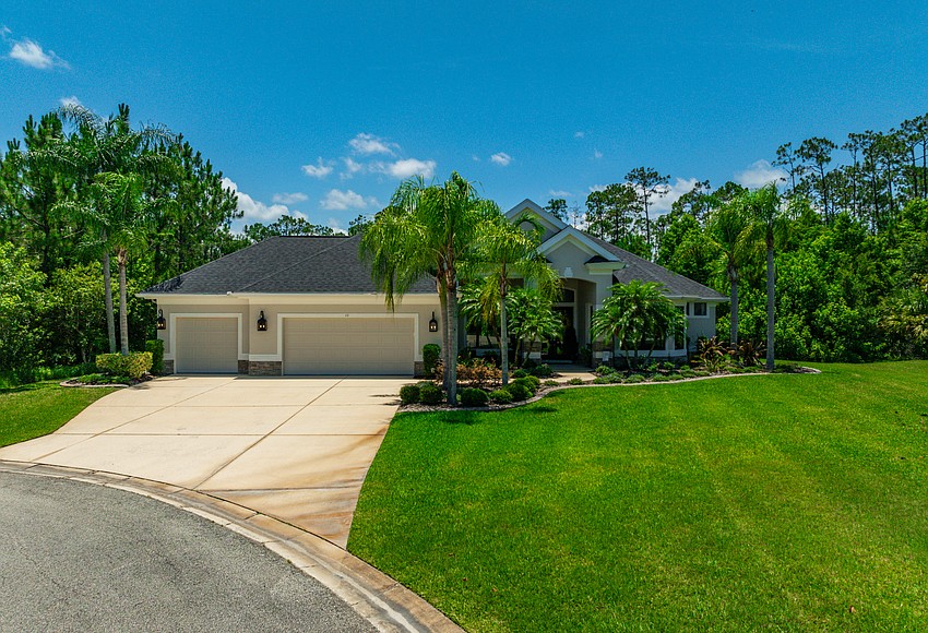 High-end mansion sold in upscale neighborhood, setting local real estate record.