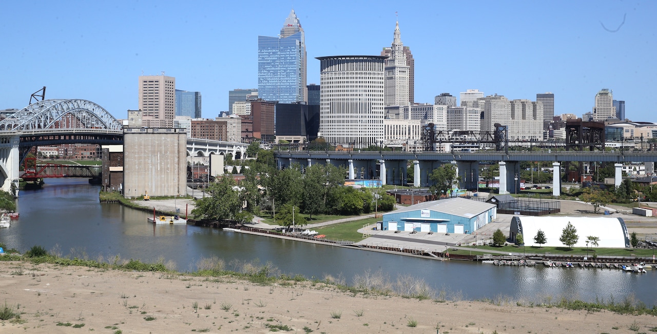 Toledo cityscape with affordable housing signs, ranking high in US affordability study.