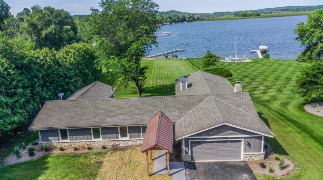 Waterfront home renovation in West Bend, Wisconsin, with lake views on sale.