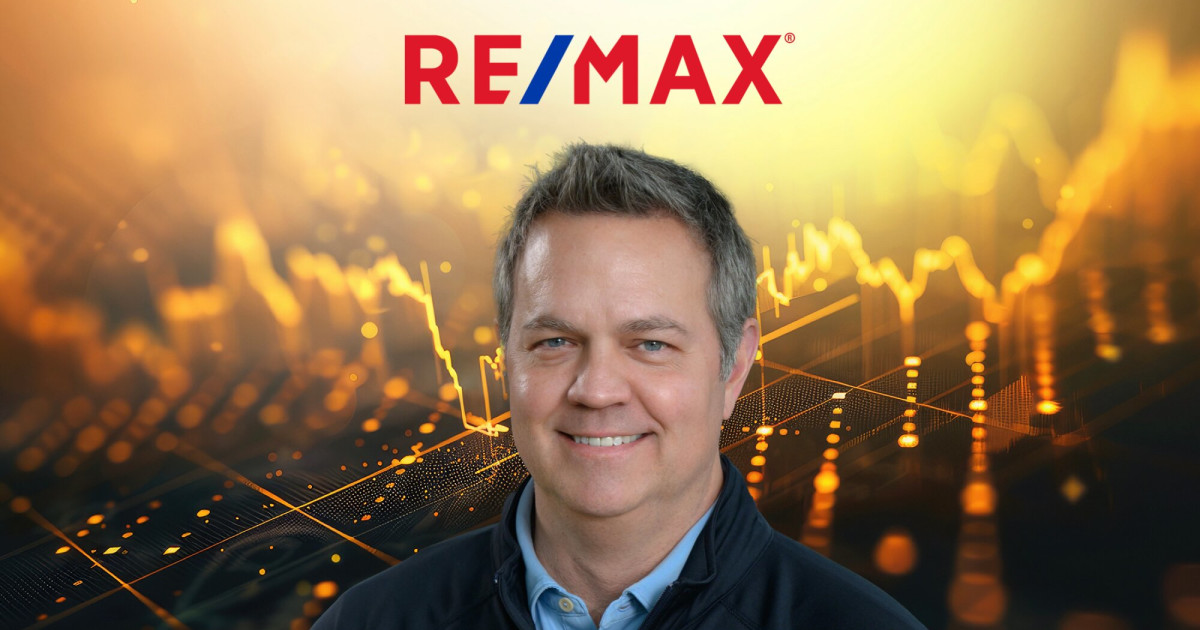 RE/MAX agents gather at a conference in Denver, Colorado, discussing market recovery.