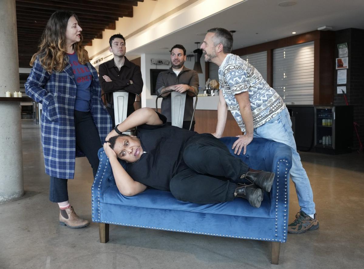 Toronto residents participate in a dramatic housing market simulation on stage.