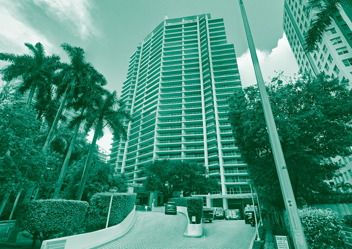 Condo building closure in Miami's Coconut Grove neighborhood, iconic address highlighted.