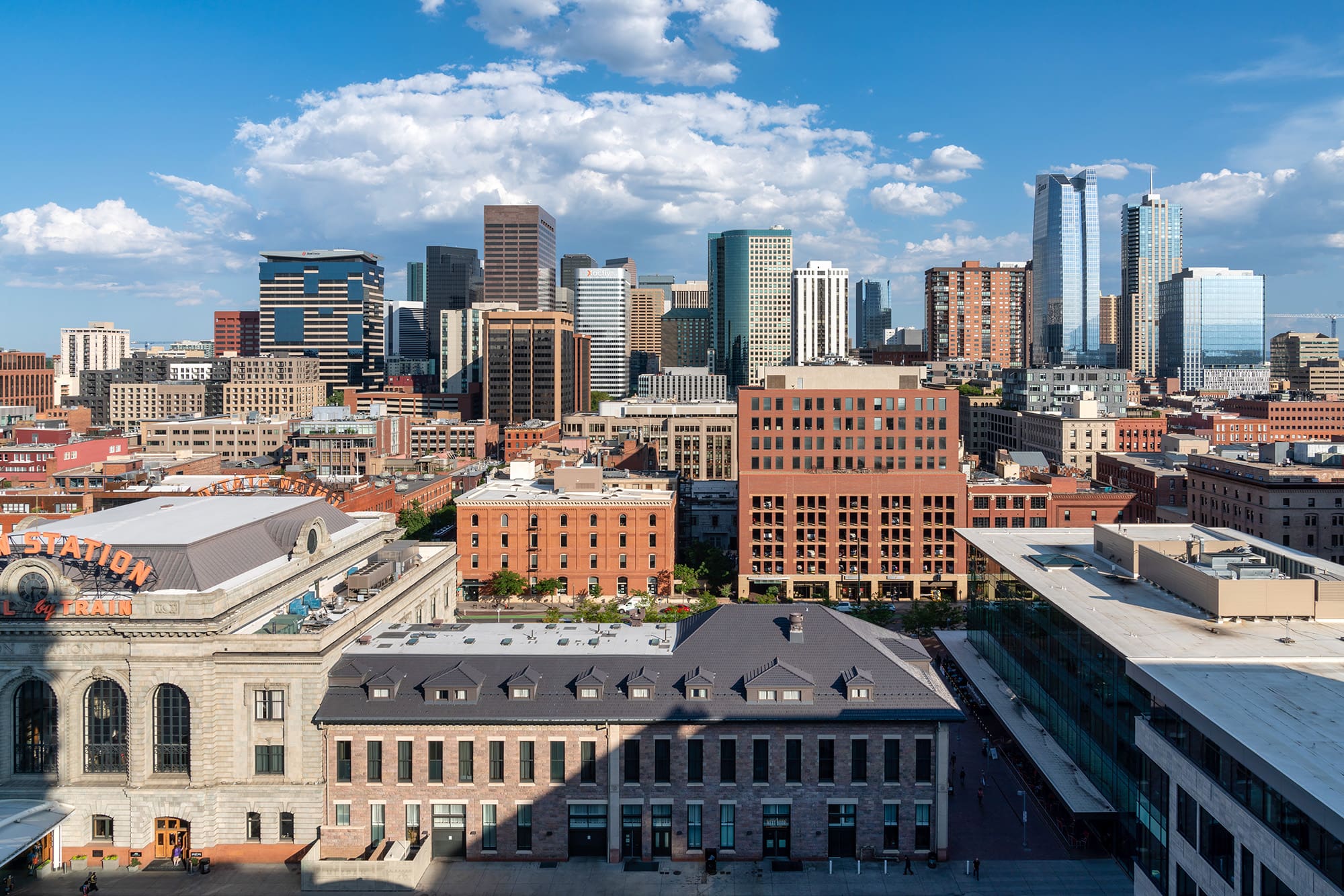 Denver commercial real estate development opportunities showcased in cityscape presentation.