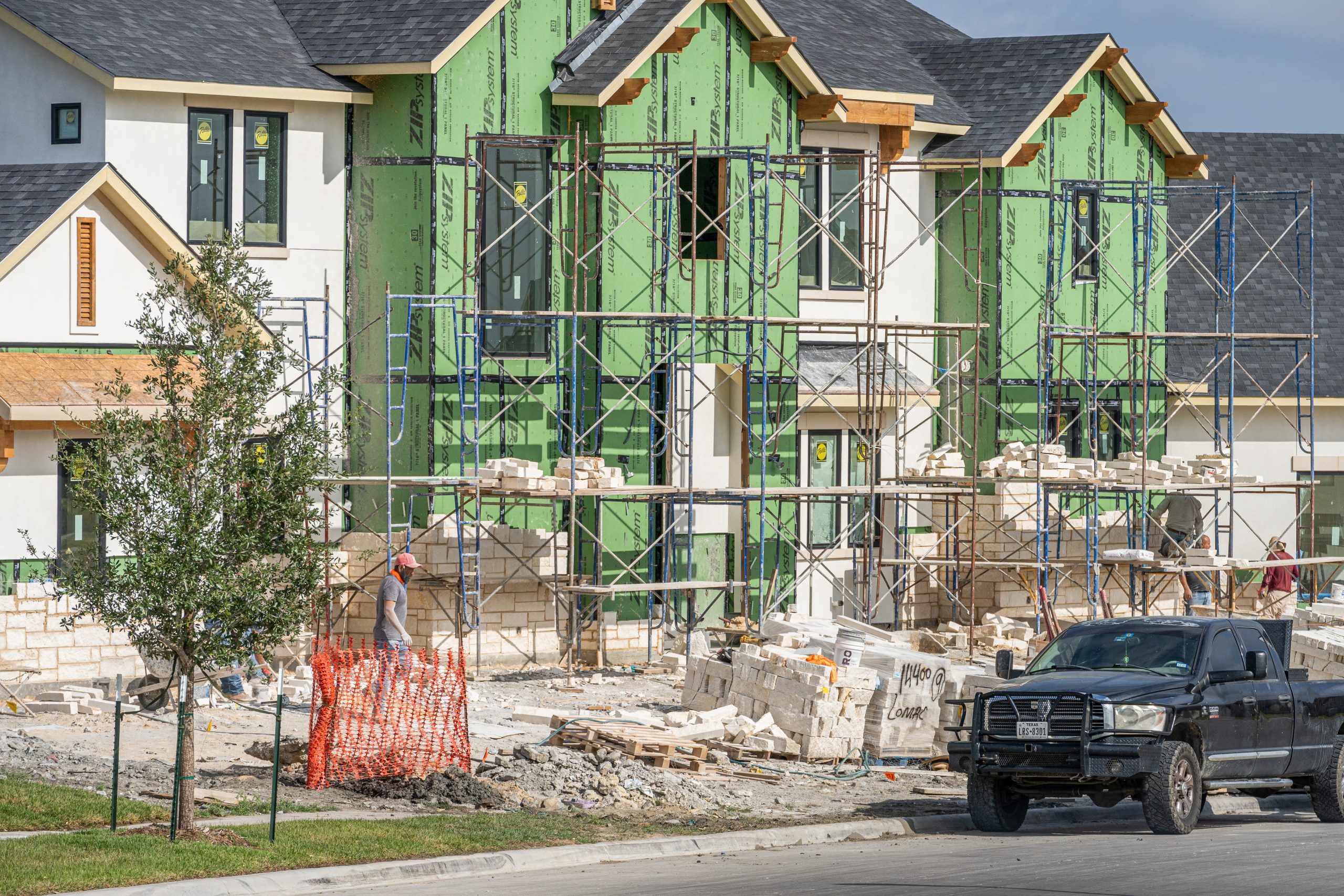 Fort Worth development progress report with cityscape and construction equipment images.