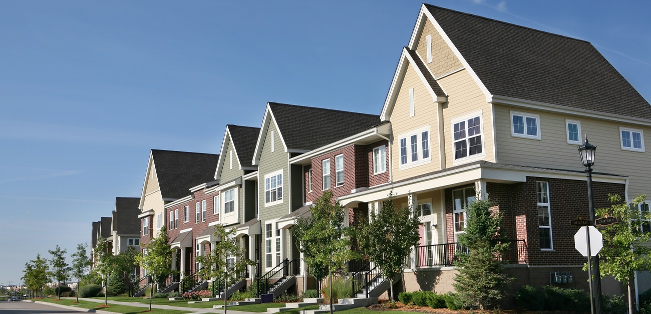 Affordable housing units being built in urban area with community involvement.