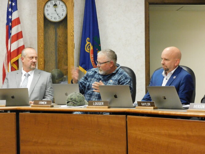 Local government officials discuss potential sale of unused district properties.