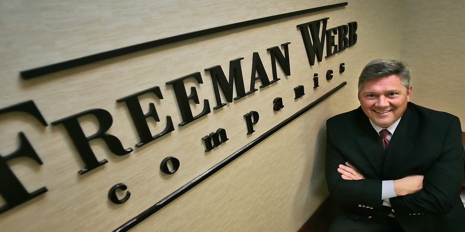 Nashville entrepreneur Bill Freeman standing in front of Freeman Webb Company building.