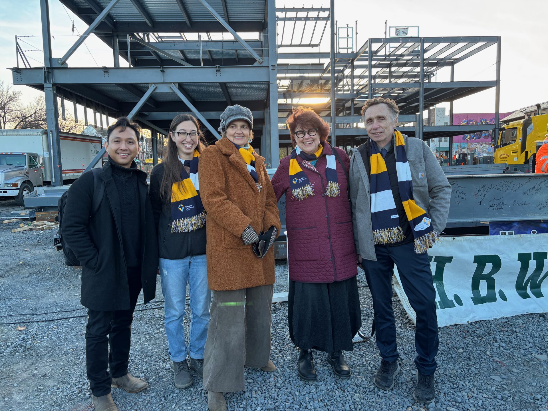 Studio G construction team celebrates topping out at Franklin Cummings tech campus.