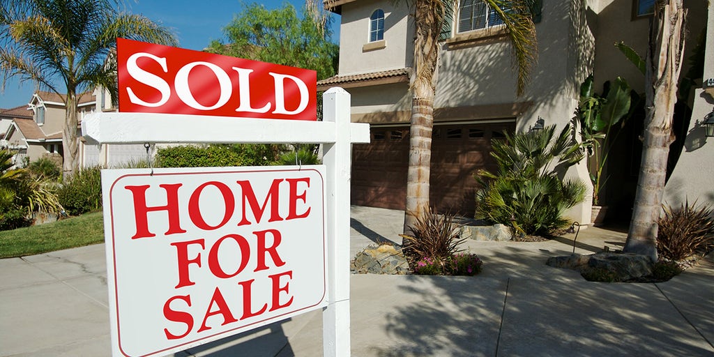 Homebuyers earning points on purchase through incentives program in real estate market.