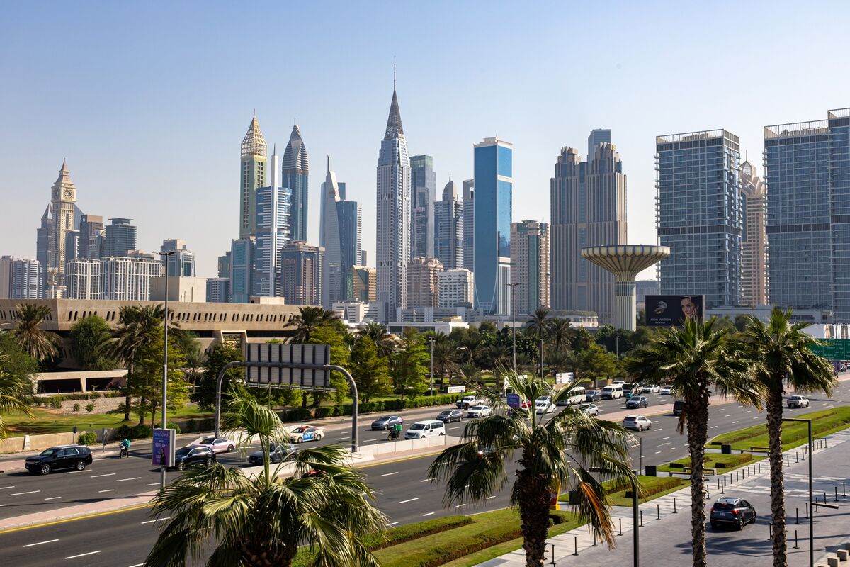 Dubai skyline with luxury properties, investors at a market conference.