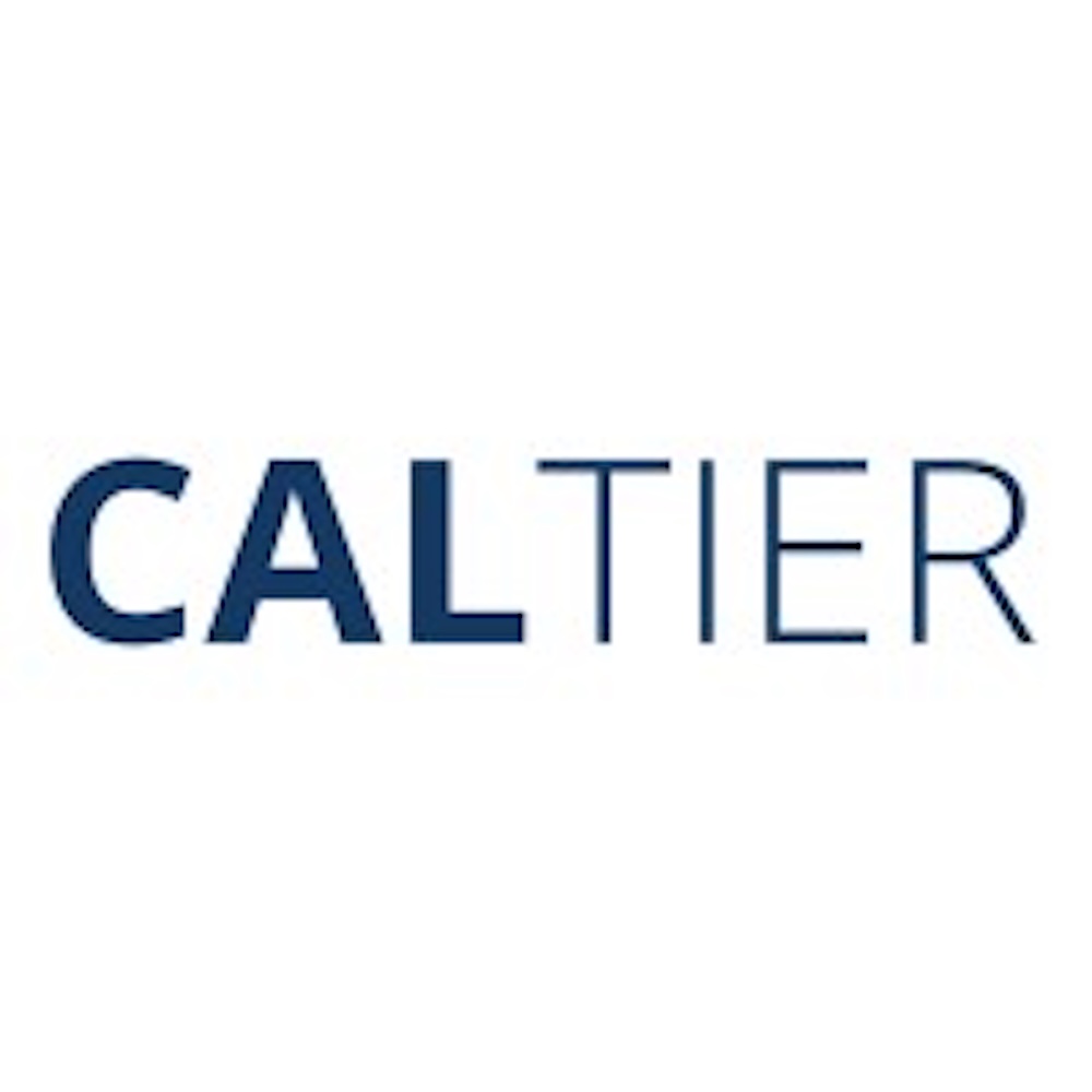 CalTier CEO receives Series B funding check in real estate office.