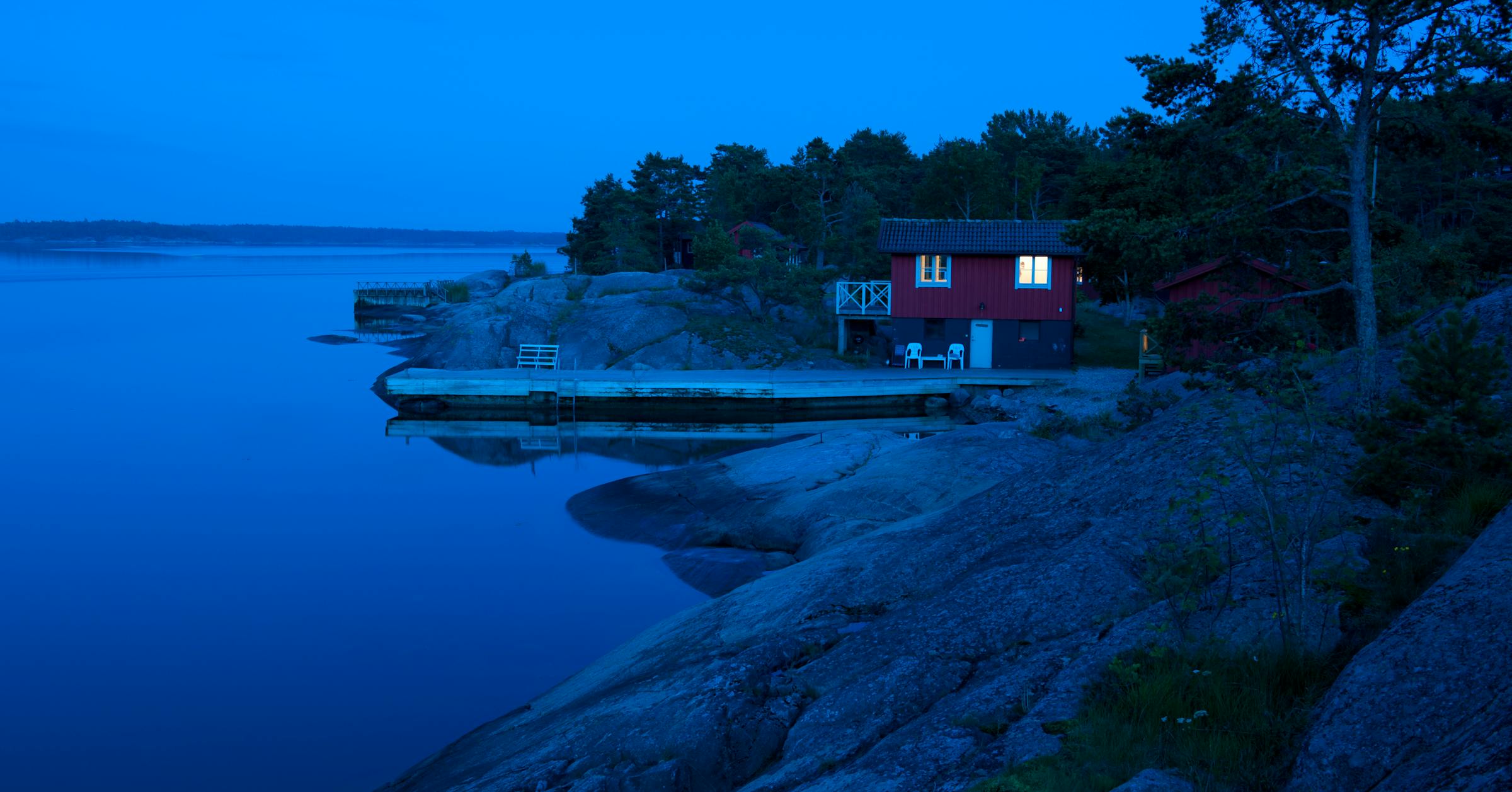 Minnesota lakefront property with serene water views and summer boating activities.