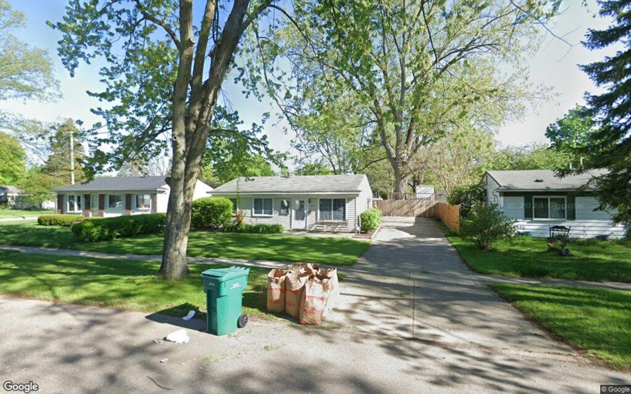 Washtenaw County homes, $200K purchase price, suburban neighborhood scene.