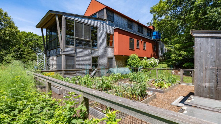 Solar-powered luxury estate on Cape Cod with ocean views and modern design.