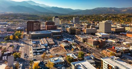 Aerial view of Colorado city skyline, predicted top US real estate market.