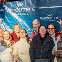 Windermere Realty celebrates milestone launch event with logo unveiling and ribbon cutting.