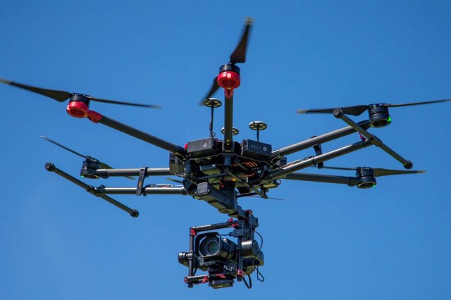 Neighbor's drone flying over backyard, privacy rights issue, property boundaries.