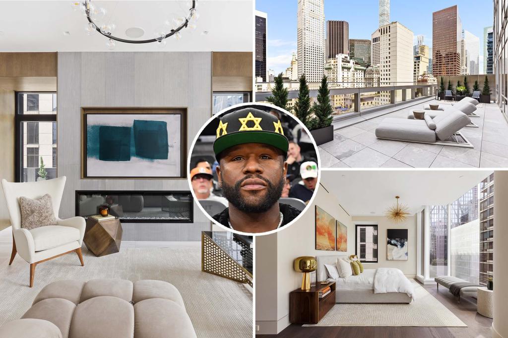 Floyd Mayweather standing in front of luxury NYC high-rise apartment building.