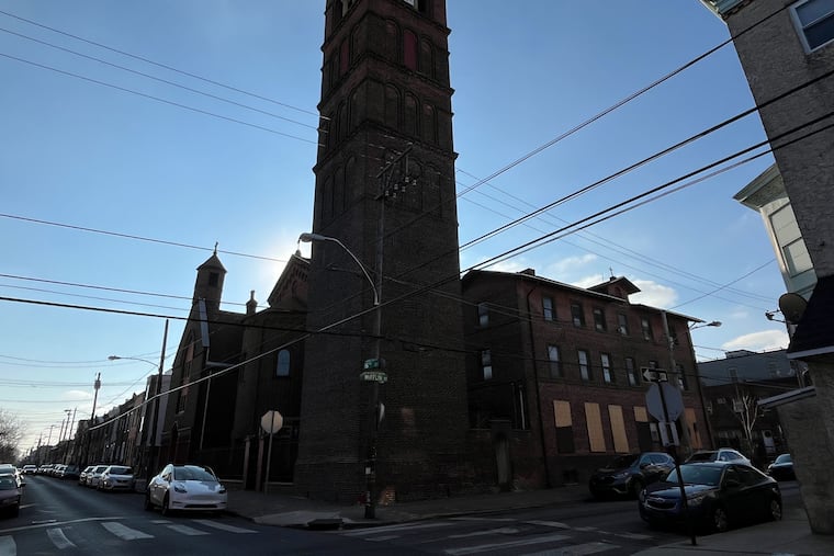 South Philadelphia church converted into apartments and event space with modern architecture.