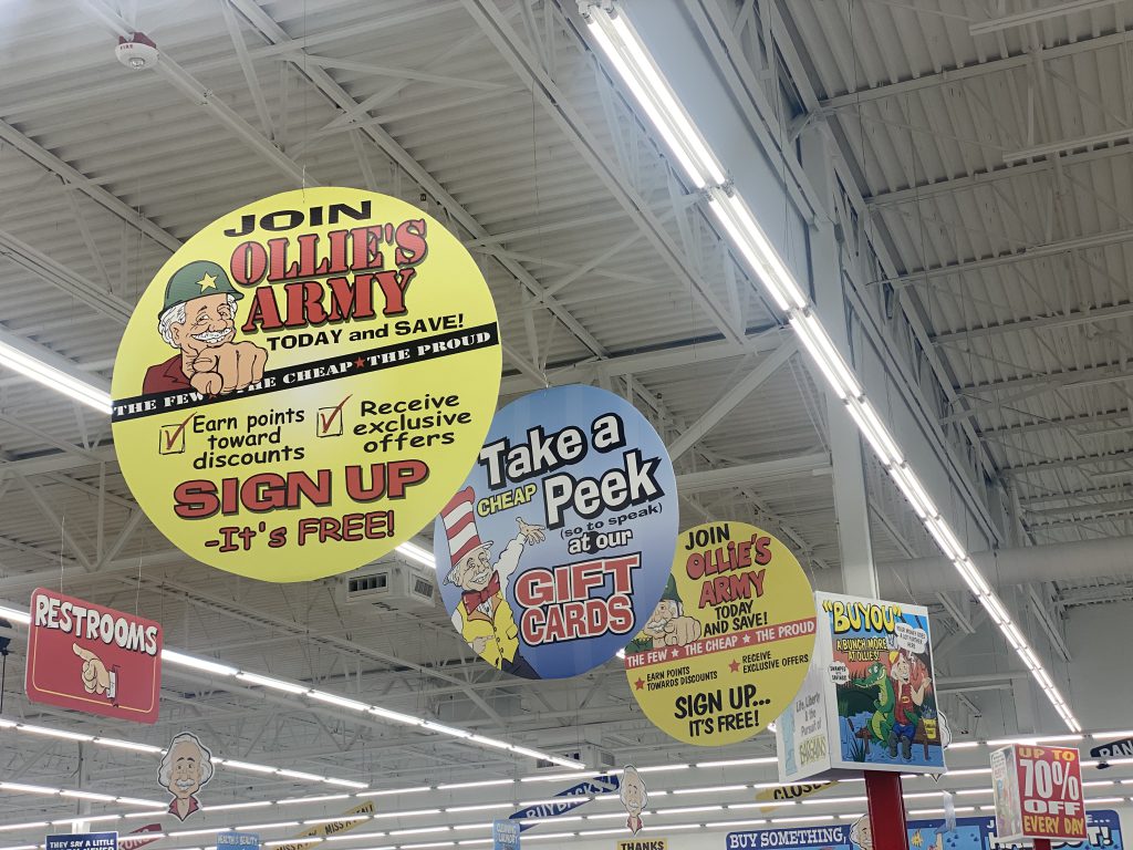 Exterior of Ollie's Bargain Outlet in West Bend, WI, opening in 2025.