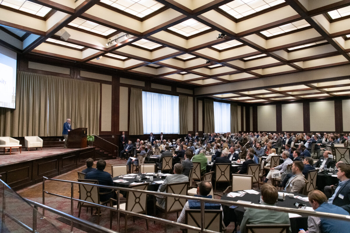 Image: Crowded convention center in Birmingham hosting real estate expo on February 20, 2025.