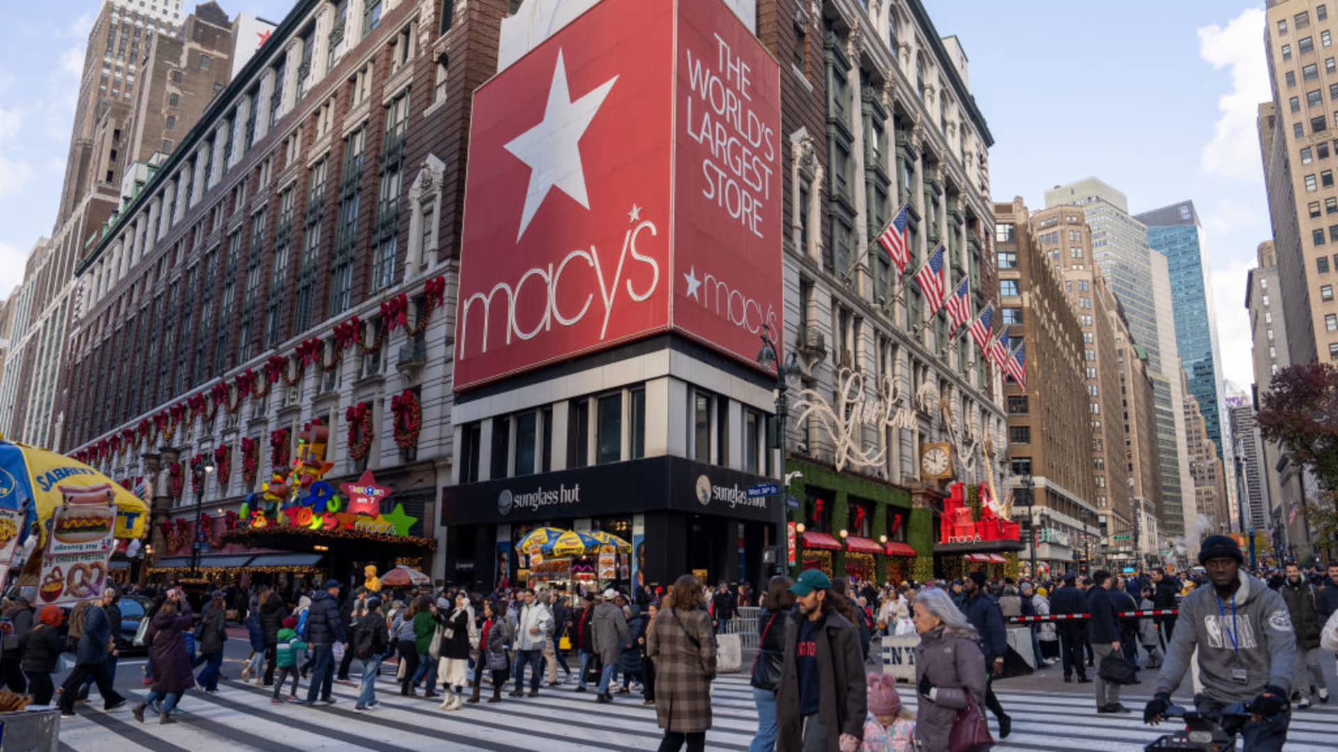 Protester outside Macy's demanding cost-cutting and property overhaul.