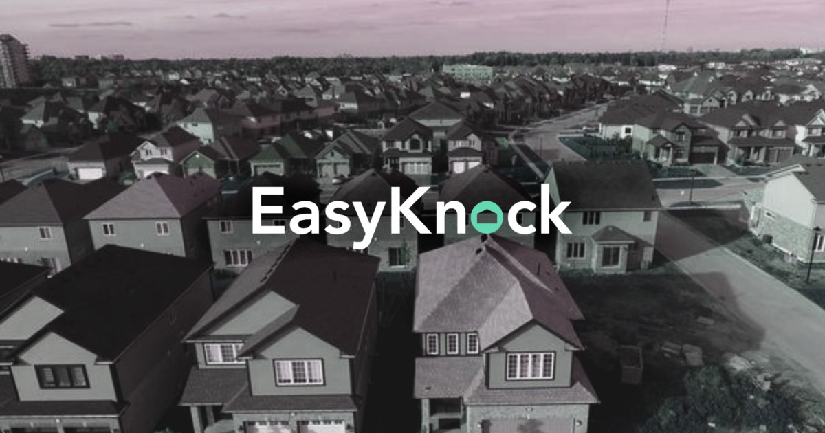 EasyKnock Proptech closes due to sale-leaseback backlash, office building in background.