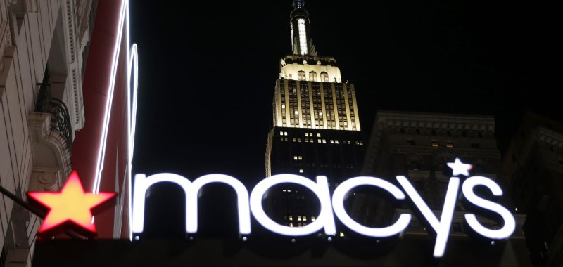 Macy's store with activists discussing real estate and cost cuts.