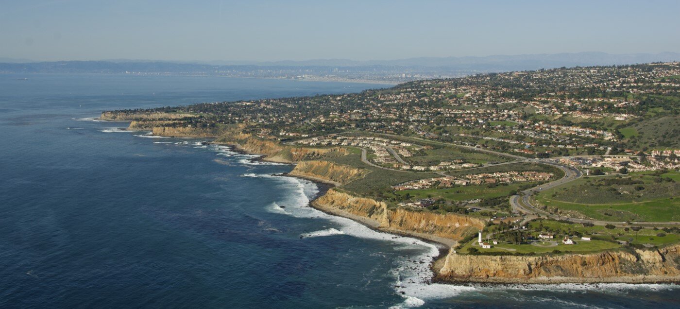 Rancho Palos Verdes homes threatened by landslides on shifting mountain terrain.