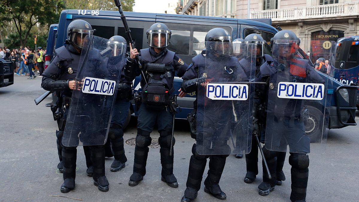 Barcelona protesters clash with police at real estate development expo.