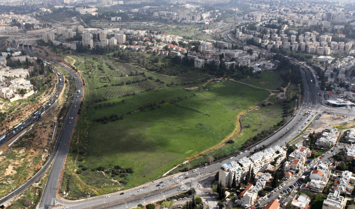 Jerusalem's Patt neighborhood real estate market with historic buildings and bustling streets.