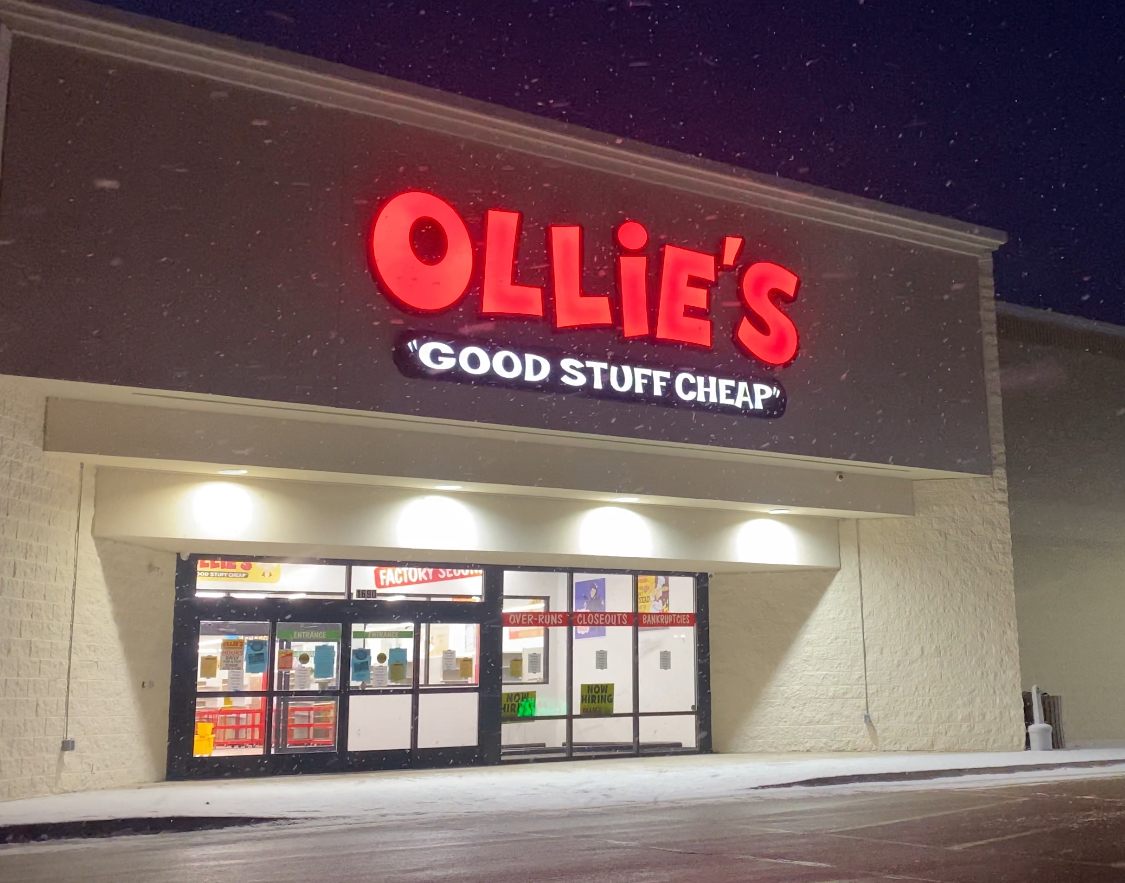 Ollie's Bargain Outlet storefront exterior with sign in suburban shopping district.