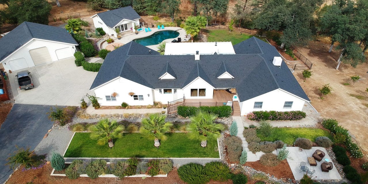 Luxury homes in upscale neighborhoods of Redding, California, with scenic views.