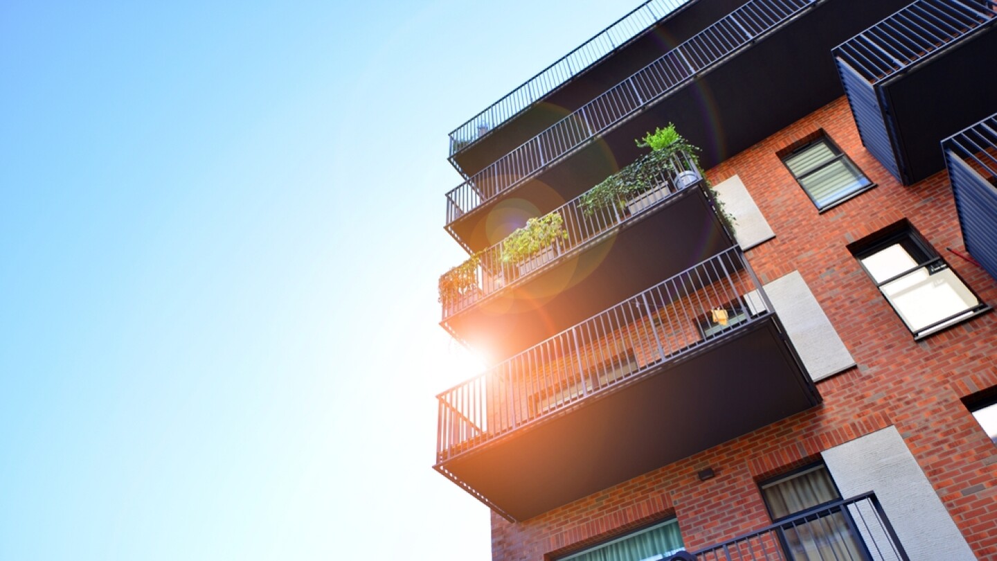 Multifamily properties with climate-resilient features in urban areas boosting investment value.