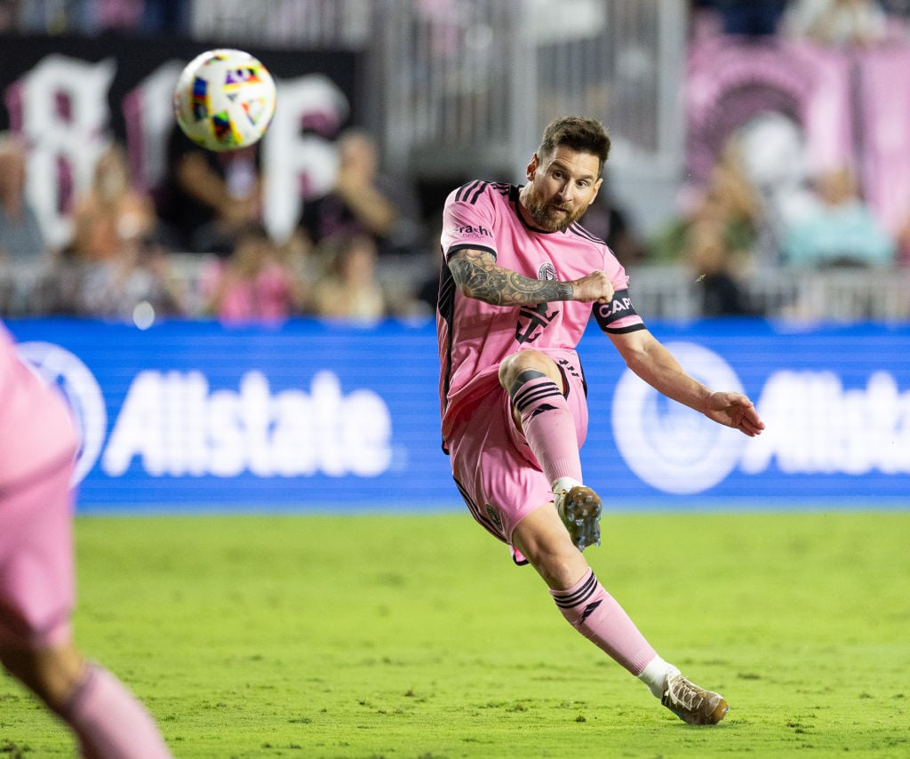 Lionel Messi standing in front of luxury properties, showcasing real estate portfolio globally.