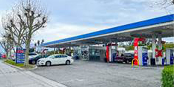 Mobil gas station, convenience store, and car wash sale in Los Angeles area.