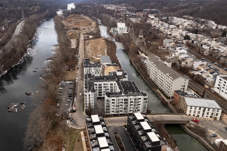 Manayunk building project with mysterious architecture and construction underway in Philadelphia.