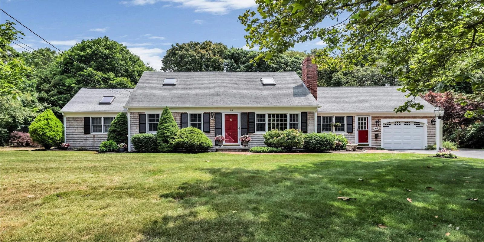 Cape Cod luxury home with poolside oasis listed for sale in Massachusetts.