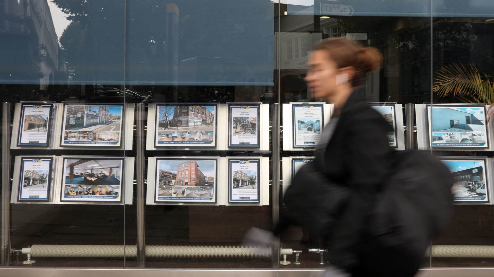 UK housing market slows with home prices dipping after nine-month growth streak.