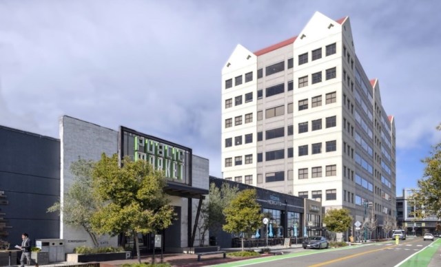 East Bay office building sold at reduced price in real estate deal.