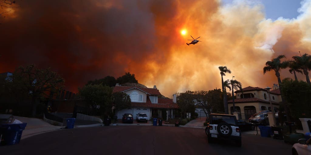 Palisades Fire aftermath in California with uncertain real estate recovery timeline.