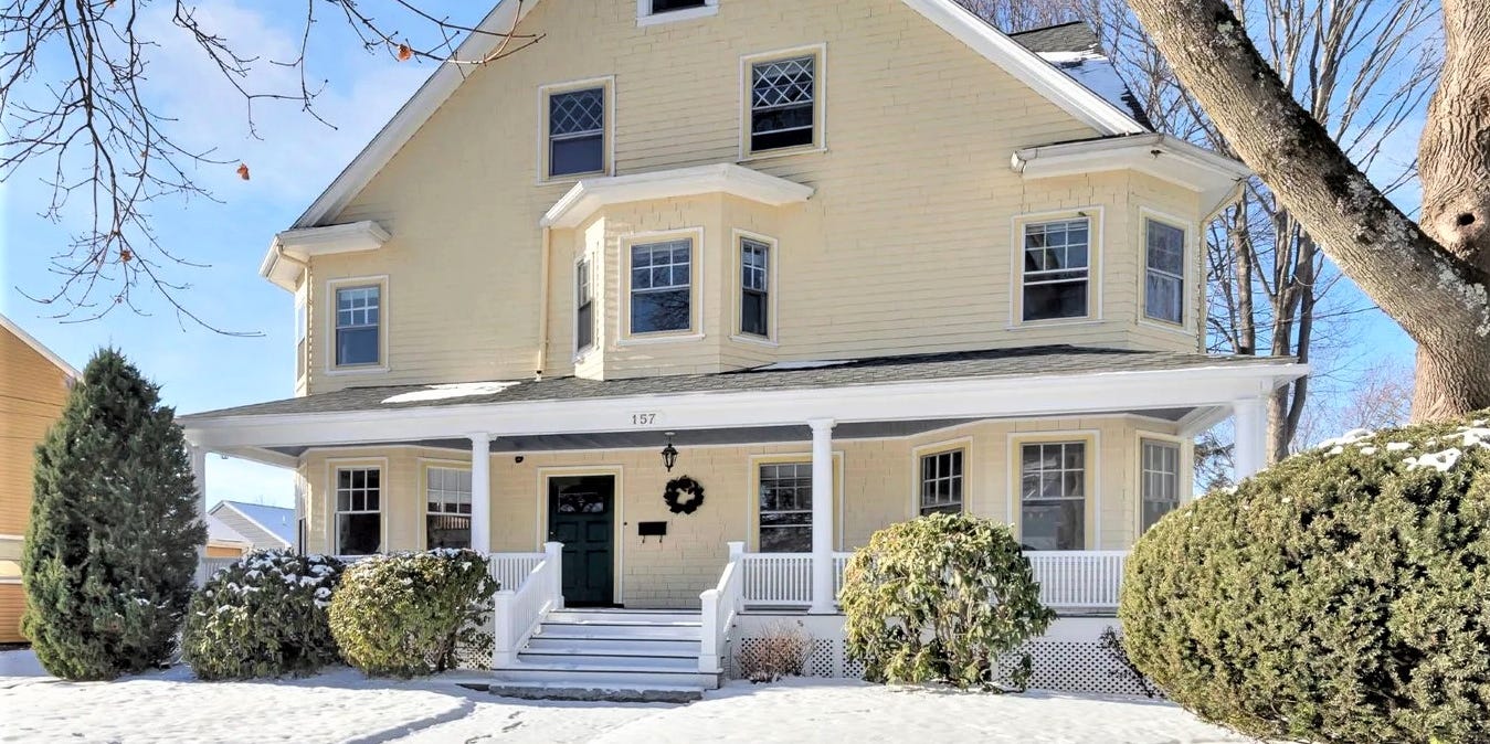 Massachusetts homebuyers gather near Boston, discussing mortgage rate hikes and inventory constraints.